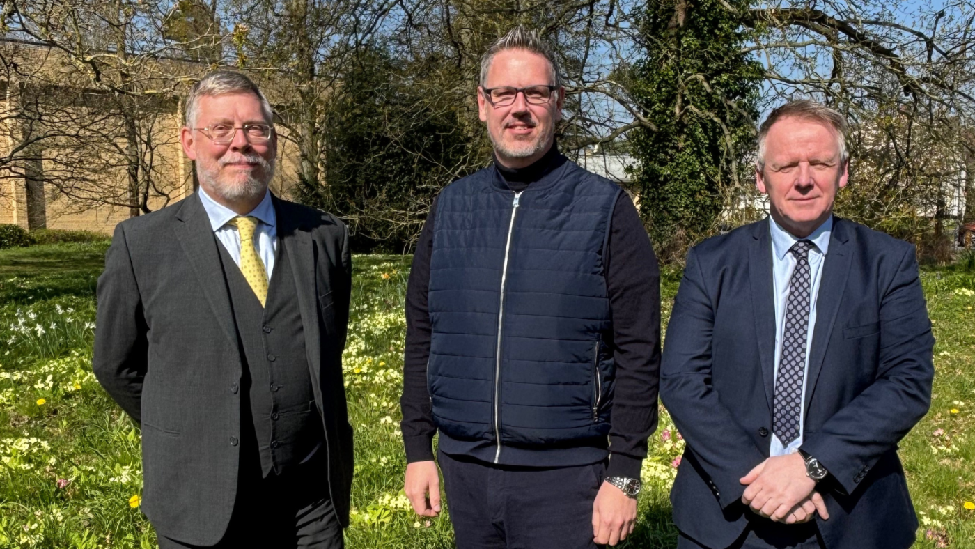 Picture of Richard Muirhead, PCC John Campion, and Chris O'Hara with trees in background