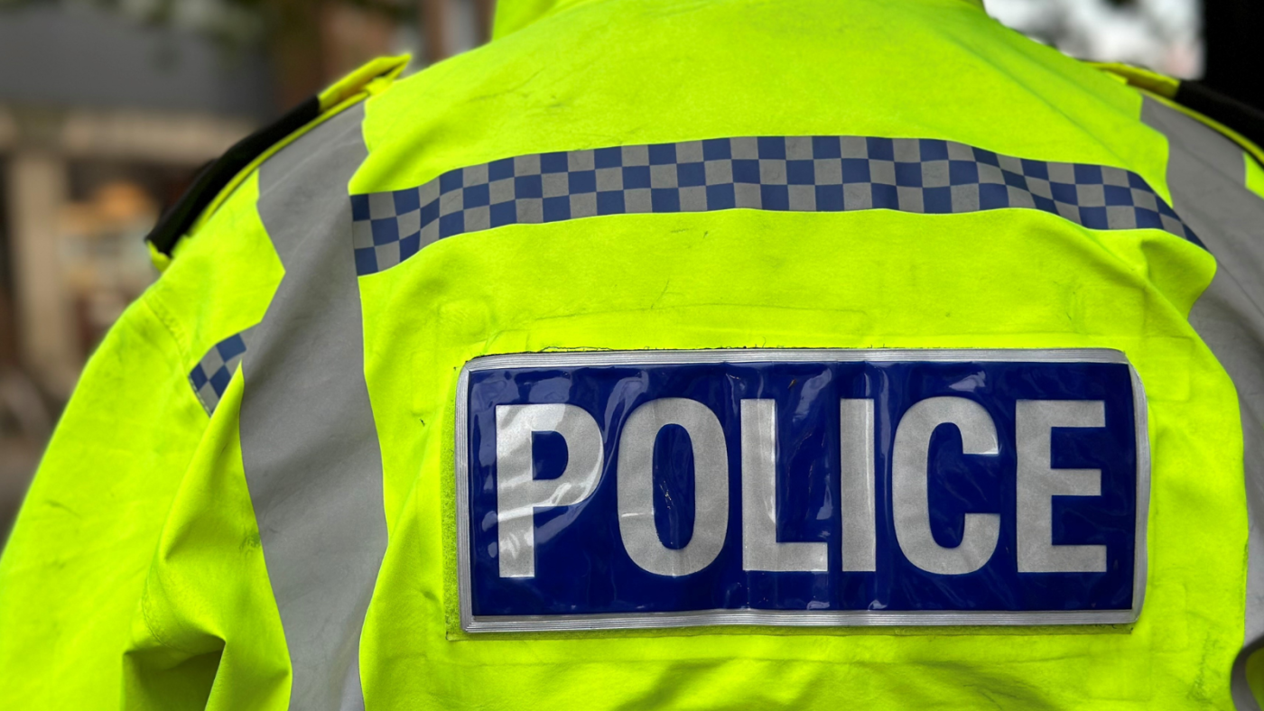 Image shows a police officer's jacket